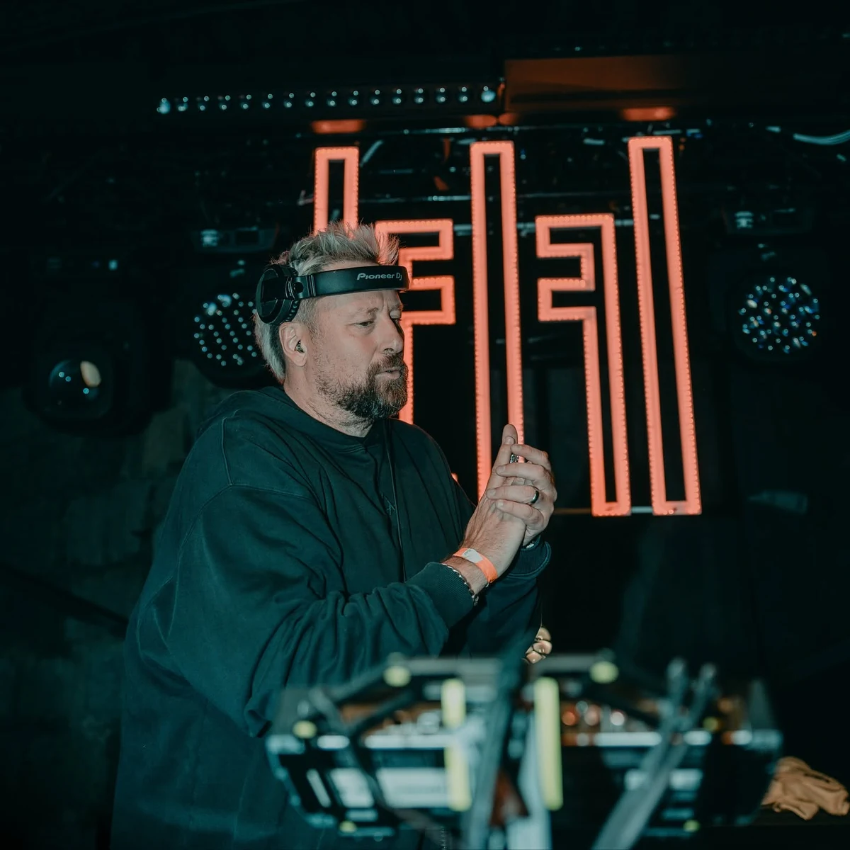 UMEK performing behind the decks